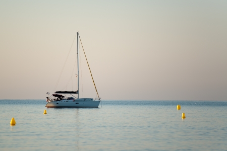 white yacht in the morning seaの写真素材