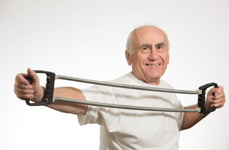 old senior man  happy and  doing sportの写真素材