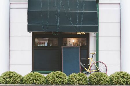 Mock Up Tables on the background of the bike and street coffeeの写真素材
