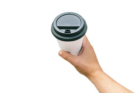 Isolated Takeaway cup, for Coffee, Tea in a guy s hand with a black cap. on a white backgroundの写真素材