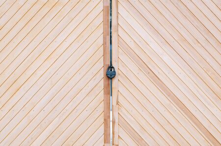 Wooden gate with an old castle in the center. Eco conceptの写真素材