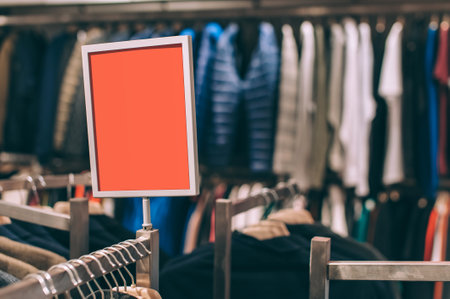 Mock up signboard on the background of a store with clothesの写真素材