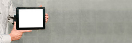 Banner Close up, Mock up tablet, presentation of business plan, man hands. against the background of...