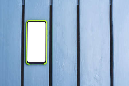 Close-up, Smartphone mockup on a gray wooden table. texture, backgroundの写真素材