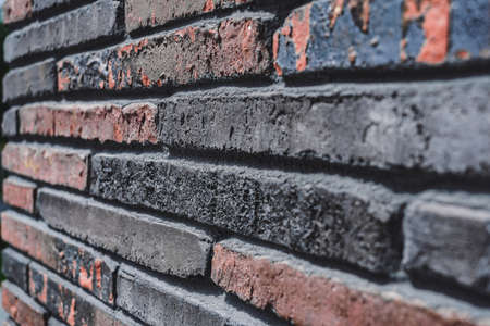 Close-up, Texture of a stone wall made of rectangular blocks. background