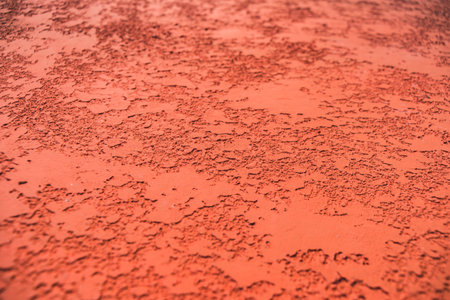Close-up, texture of a facade made of decorative red plaster