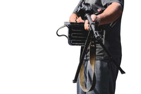 Isolate, a military machine gun in the hands of a man. on a white backgroundの写真素材