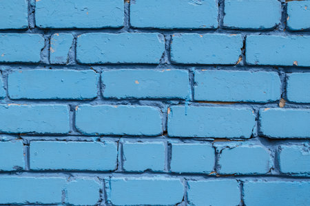 Close up background texture of blue painted retro brick wallの写真素材