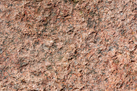 close up texture of natural stone abstract cobblestone backgroundの写真素材