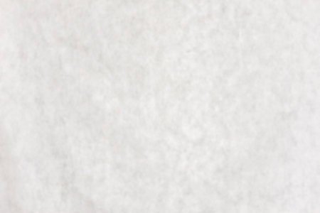 Blurred studio gray fabric backgroundの写真素材