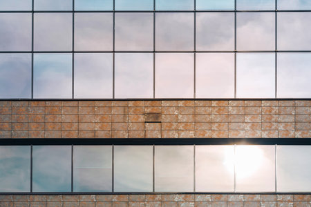 Close-up of glass windows of a modern buildingの写真素材