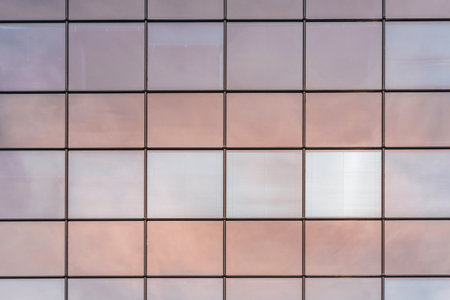 Close-up of glass windows of a modern buildingの写真素材