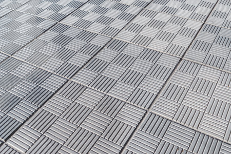 Close-up background texture of gray paving slabsの写真素材