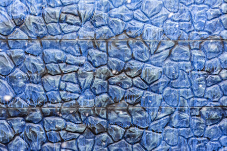 Close up of folded gray stone wall or fence backgroundの写真素材