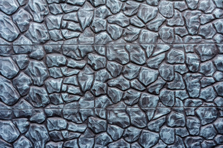 Close up of folded gray stone wall or fence backgroundの写真素材