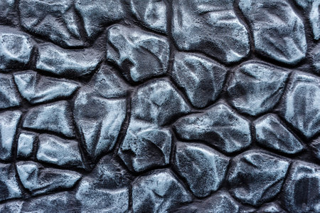 Close up of folded gray stone wall or fence backgroundの写真素材