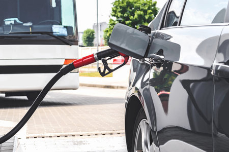 Refilling the car. View of a gas station with fuel hosesの写真素材