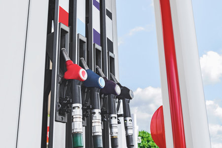 Close-up, Column with fuel guns in red, yellow and green. at a gas stationの写真素材