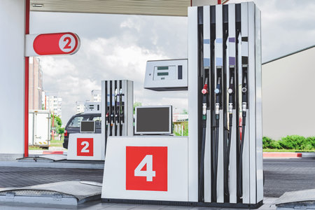 Gas station close-up with filling pistolsの写真素材