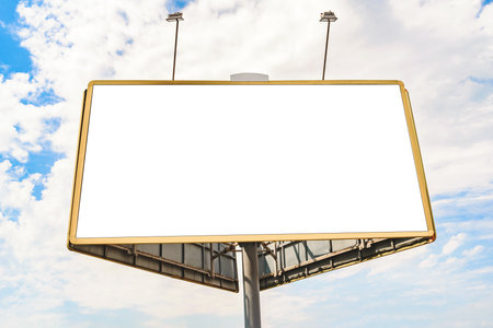 Empty mockup, billboard or screens on the background of the sky with cloudsの写真素材
