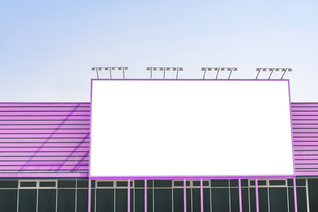 Large empty billboard mockup on the purple wall of a building. Outdoor advertising on the led panelの写真素材