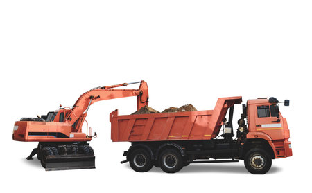 Isolate, Orange excavator loads dirt into a dump truck on a white background. Ideal for...