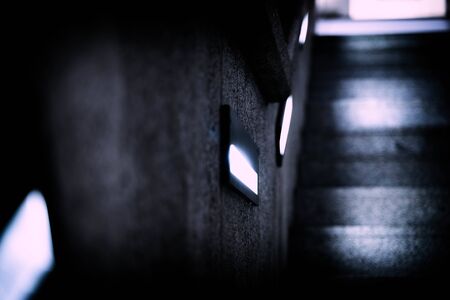 The atmosphere of night city. White light. Stone staircase.の写真素材