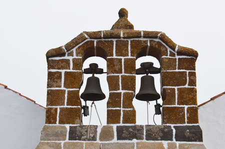 bell tower of a church on the island of La Gomera, island of the Canary archipelago, Spainの写真素材
