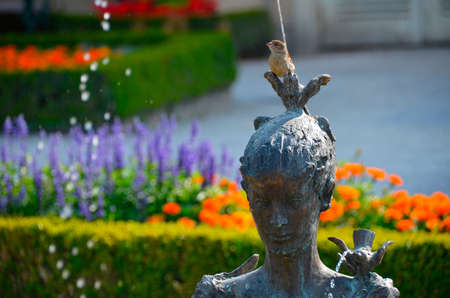 Drink from the Papageno fountain in the Mirabell Gardens in the city of Salzburg, Austriaの写真素材