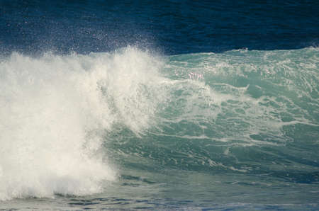 Wave breaking in the coast of Arinaga. Aguimes. Gran Canaria. Canary Islands. Spain.