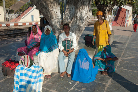 Madhya Pradesh, India-January 27, 2010: Indian family waiting their train in the town of Umaria.のeditorial素材
