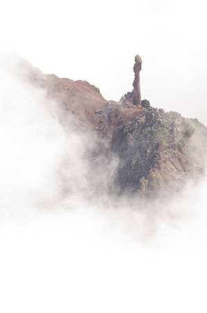 Rocky cliff in the fog. Caldera de Taburiente National Park. La Palma. Canary Islands. Spain.の写真素材