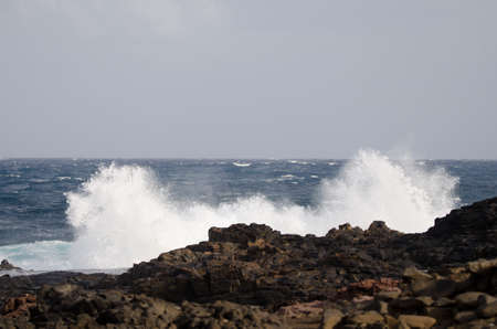 Wave breaking against the shore. El Confital. La Isleta Protected Landscape. Las Palmas de Gran...