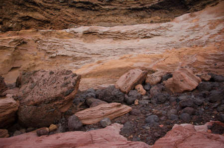 Cliff and rocks. Caleton Oscuro. Montana Clara. Integral Natural Reserve of Los Islotes. Canary...