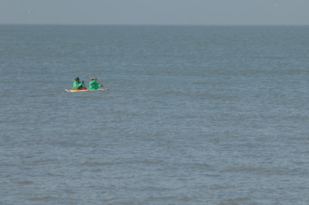 Popenguine, February 6, 2009: Fishermen in their boat on the coast of Popenguine. Thies. Senegal.のeditorial素材