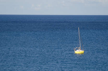 Yacht in the coast of Sardina del Norte. Galdar. Gran Canaria. Canary Islands. Spain.の写真素材