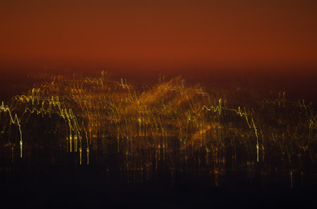 Effect of the lights of a population at sunset when moving the camera. Southeast of Tenerife. Canary...