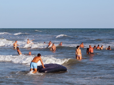 people having fun and recreation at a black sea beachのeditorial素材