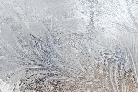 a frosted glass surface background taken  in cold winter weather from inside of buildingの写真素材