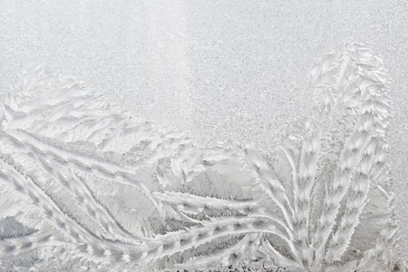 a frosted glass surface background taken  in cold winter weather from inside of buildingの写真素材
