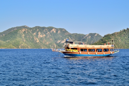 MARMARIS, TURKEY - JULY 24, 2013  Turkish houseboat with tourists at a popular Mediterranean resort on July 24, 2013 in Marmaris, Turkey のeditorial素材