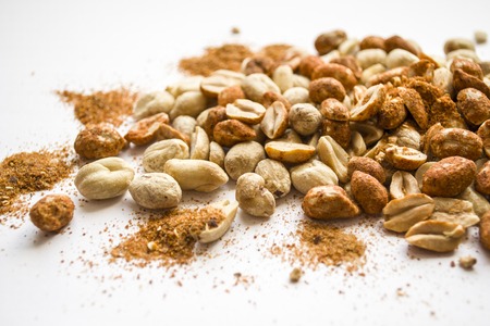 Nuts and spices. Nuts with paprika isolated