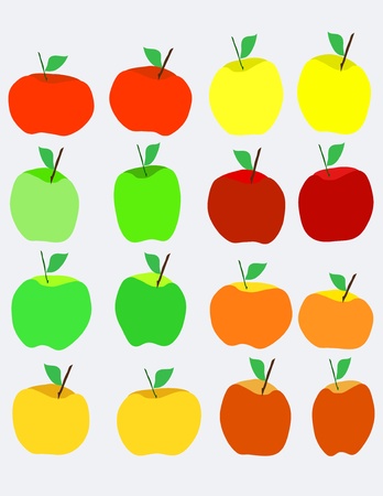 a few apples in pastel shades of red, yellow and red on a gray backgroundの写真素材