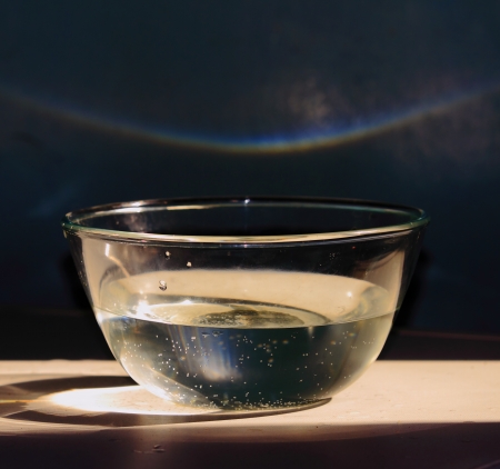  vessel with water, shadows, reflections,rainbowの写真素材