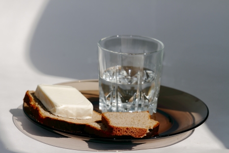 a glass of vodka and  bread,  cheeseの写真素材