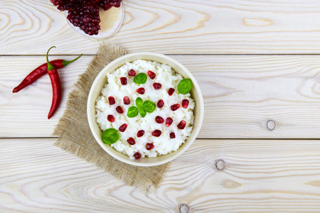 Curd rice. A popular dish from South India with rice, yogurt, spices and pomegranate. Top view.の写真素材