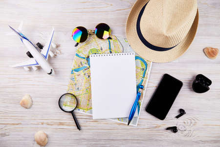 Travelers notebook with accessories on wooden desk