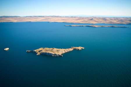Lake Baikal from the air on a summer day. View of the islands of Ogoy, Oltrek and Olkhon.の写真素材