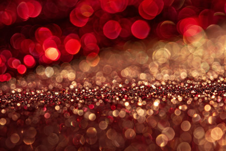 Abstract background with sparkling gold and red sequins, festive background for Christmas and New Year, blurred bokeh backgroundの素材