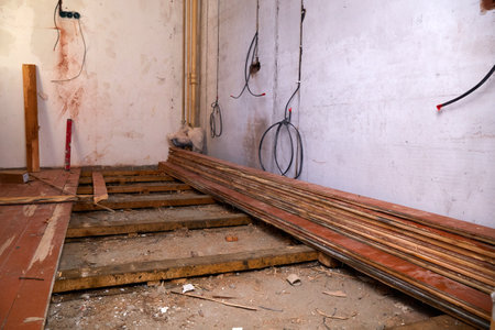 Restoration work in the house to replace old wooden floors. Renovation of residential premises.の写真素材